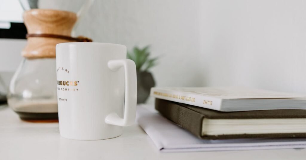 A serene workspace featuring coffee, books, and a Chemex for a productive morning.